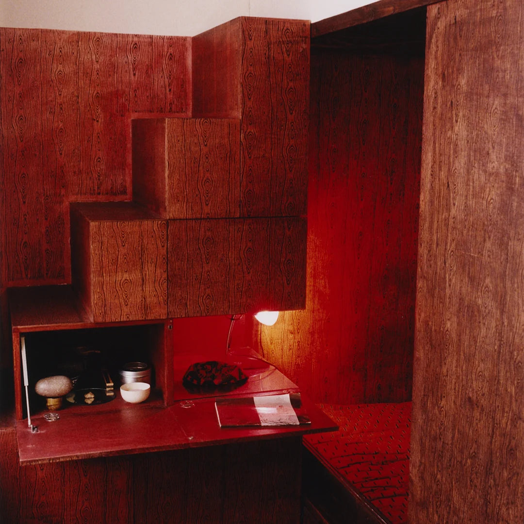 Simone Books Scenery Issue 5 magazine featuring a deep red wood-paneled interior with a built-in desk and lamp